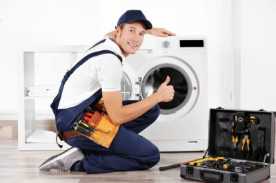 Technician is repairing Dryer in Muhaisnah